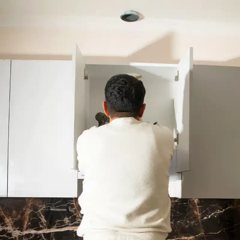 Installing cabinets and closets with precision and style, creating convenience and organization.