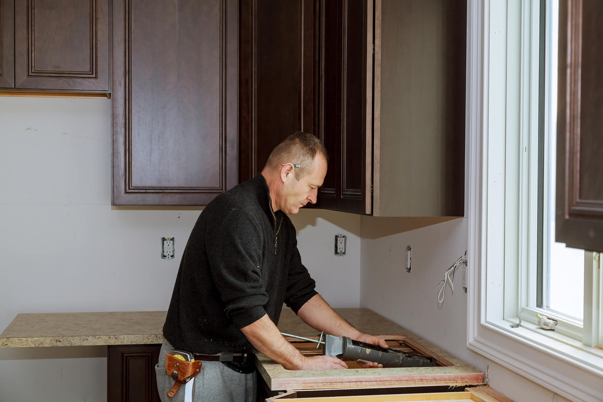 Side view man working home